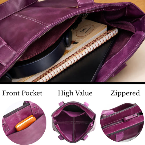 Purple leather tote interior with front pocket and zippered valuables pocket