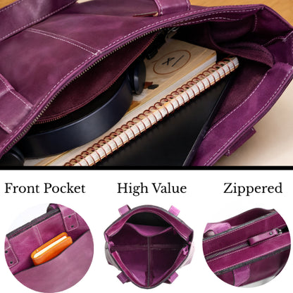 Purple leather tote interior with front pocket and zippered valuables pocket