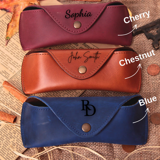 Personalized leather sunglasses cases in Cherry, Chestnut, and Blue