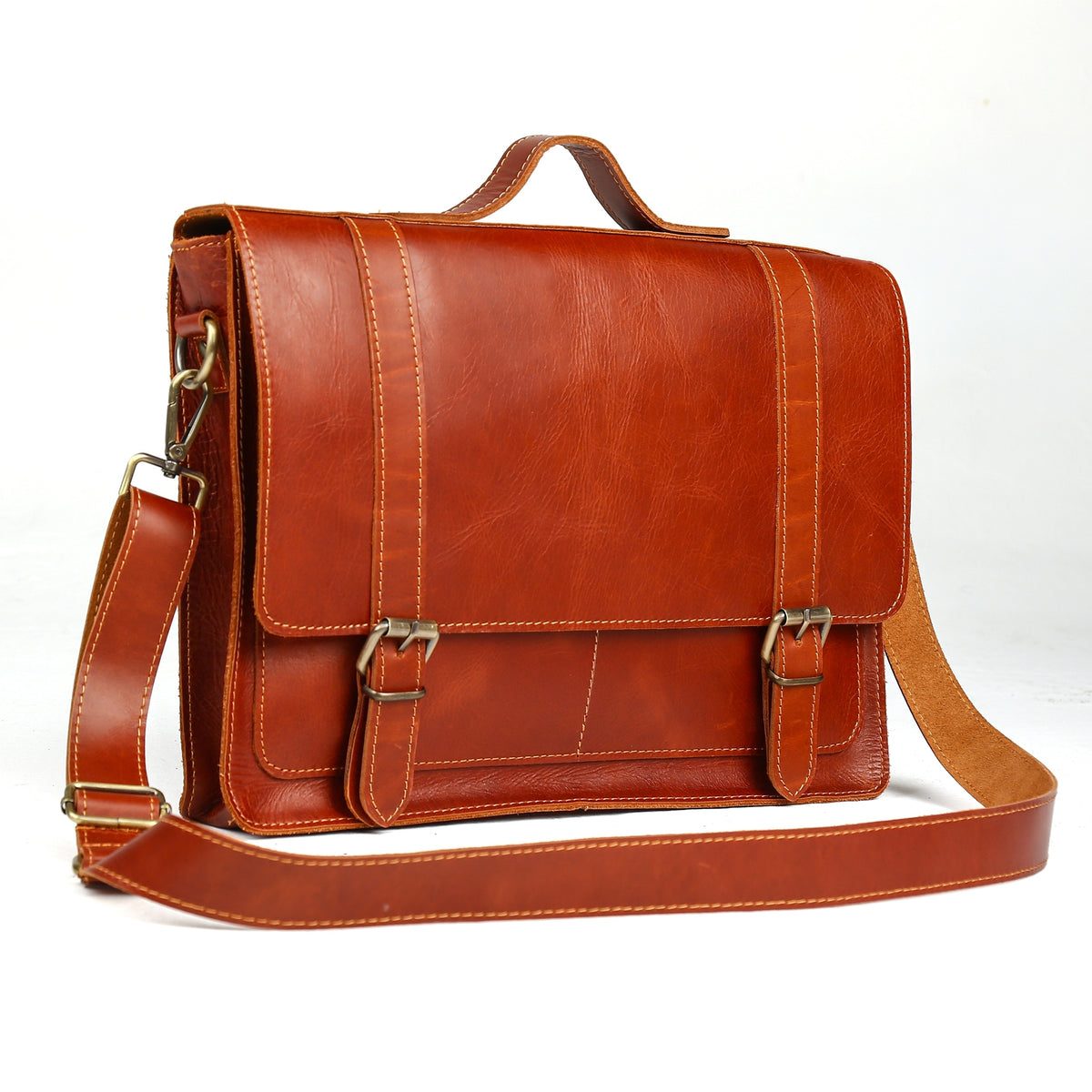 Front view of chestnut leather briefcase with adjustable shoulder strap