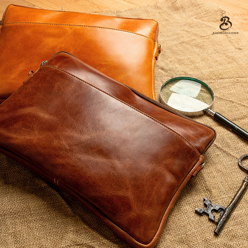 Camel and chestnut full grain leather laptop bags