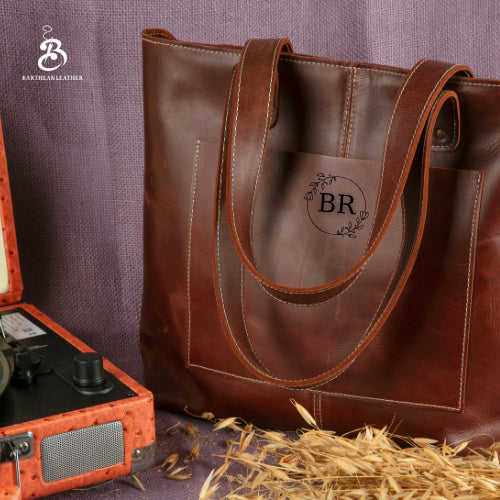 Chestnut leather tote bag with a circular BR monogram