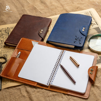 Chestnut, dark brown, and blue A5 portfolios with personalized monogram examples